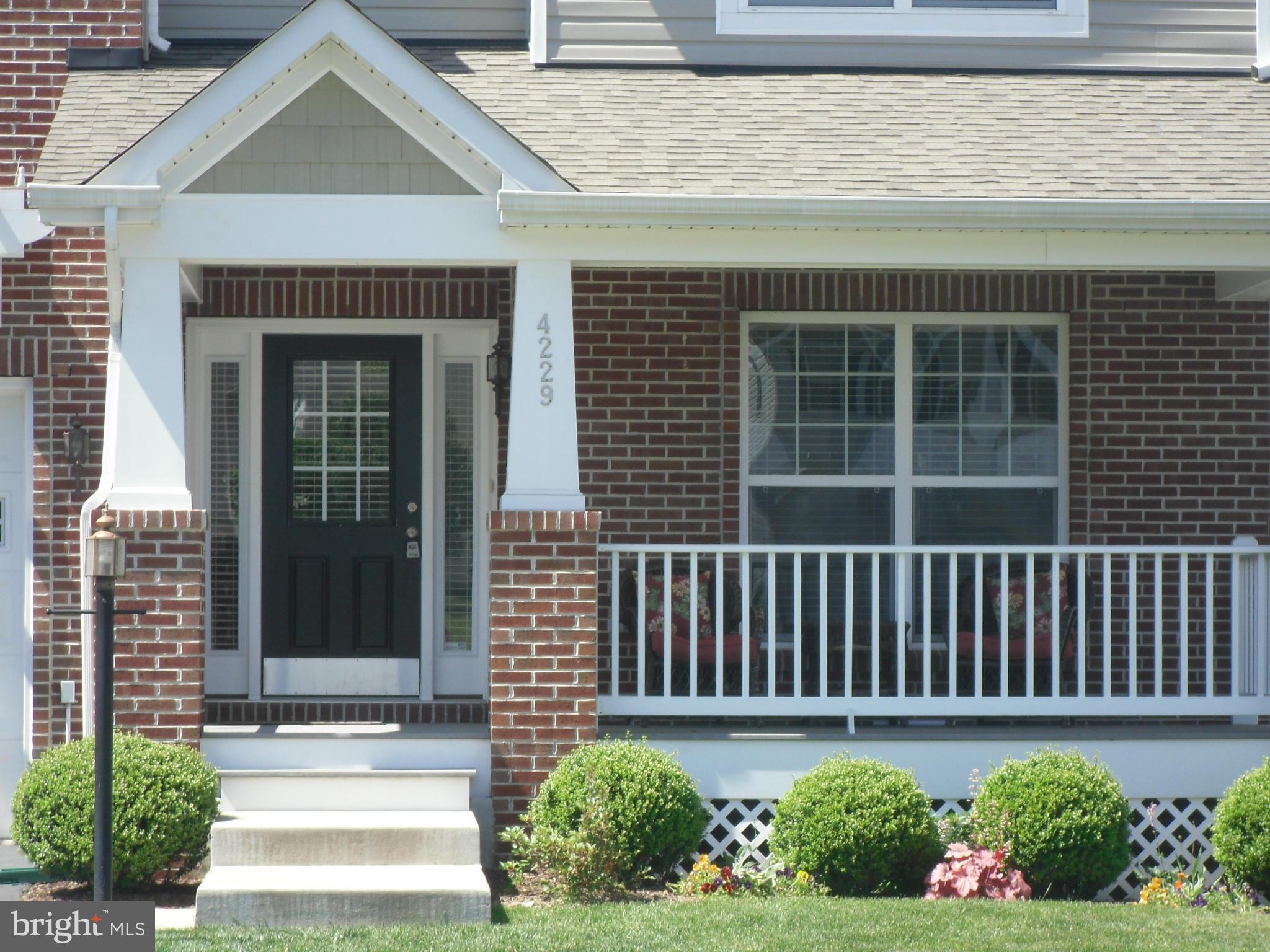 4229 Meyers Road Triangle, VA 22172 - Photo 2 of 29 a front view of a house with a yard