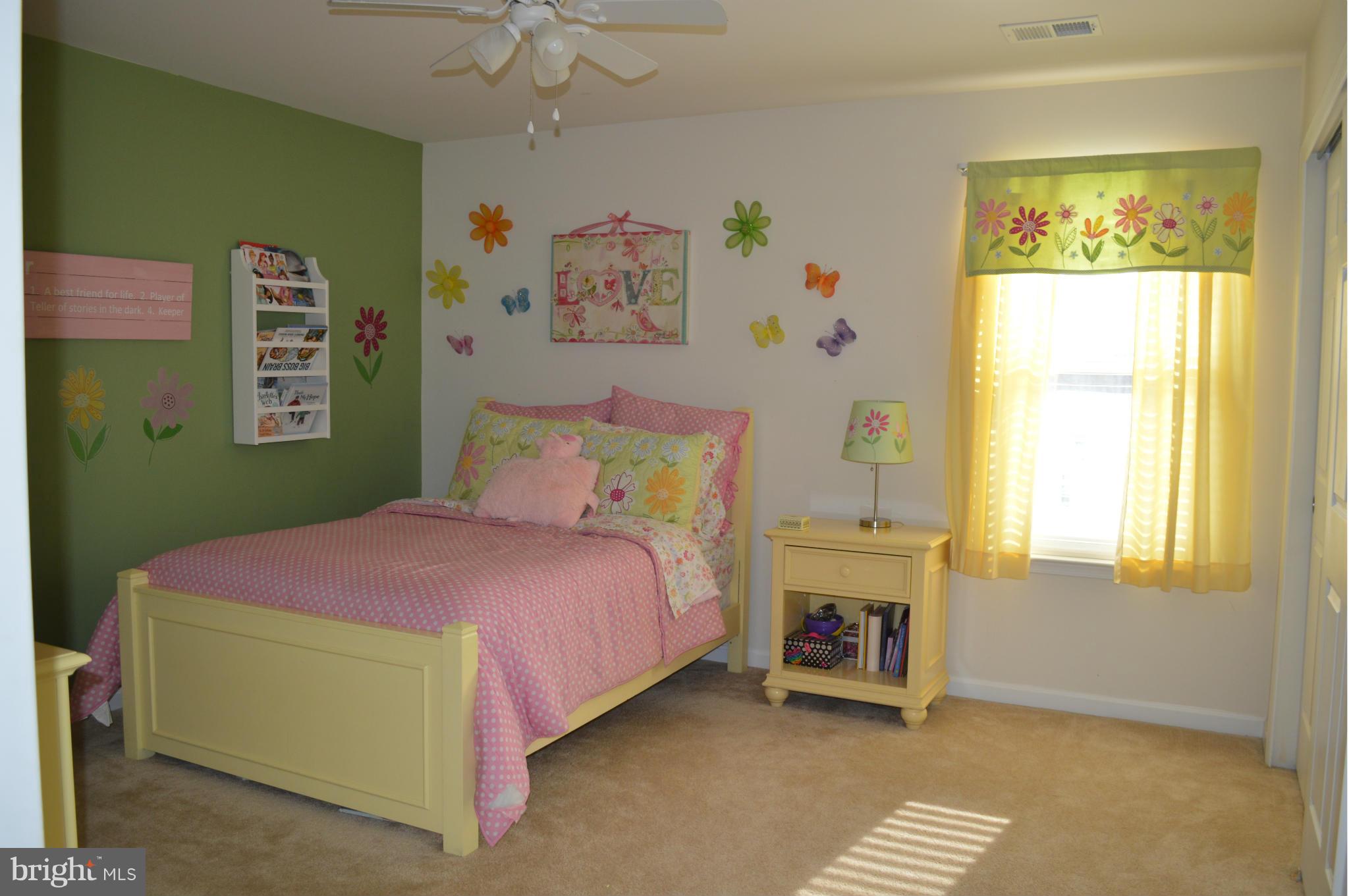 4229 Meyers Road Triangle, VA 22172 - Photo 18 of 29 a bedroom with a bed and a window