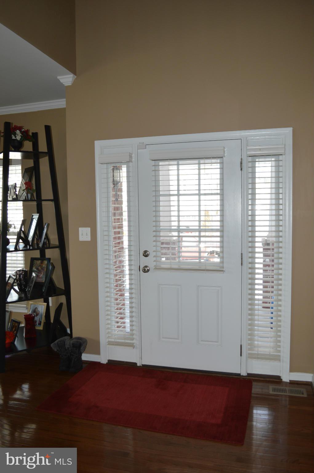 4229 Meyers Road Triangle, VA 22172 - Photo 3 of 29 a view of a room with wooden floor and windows
