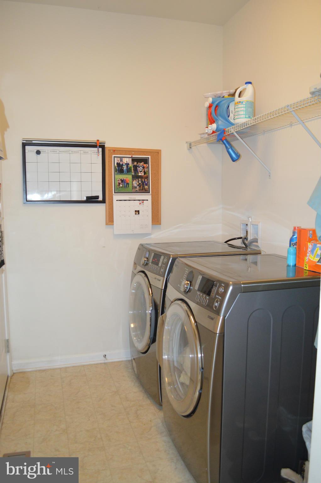 4229 Meyers Road Triangle, VA 22172 - Photo 24 of 29 a utility room with multiple dryer and washer