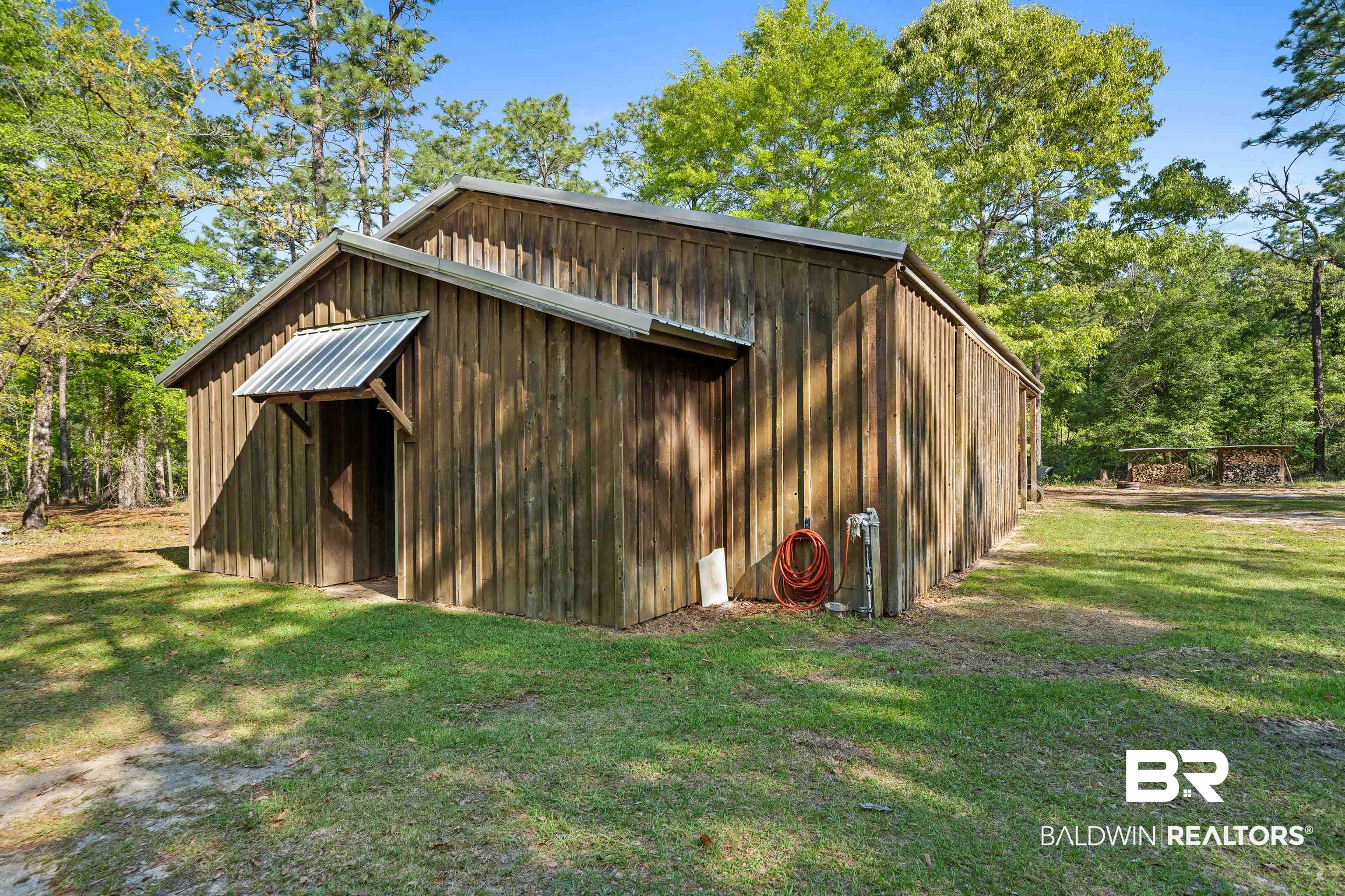 47252 Emmons Road Bay Minette, AL 36507 - Photo 45 of 50 View of pole building featuring a lawn