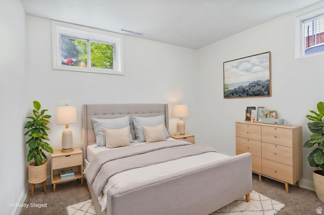 141 South 400 East Logan, UT 84321 - Photo 25 of 41 Carpeted bedroom with baseboards - Virtually Staged