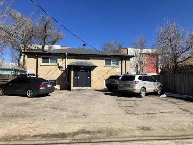 a car parked in front of a building
