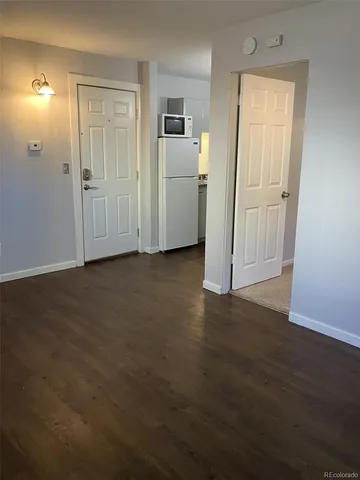 an empty room with a bathroom