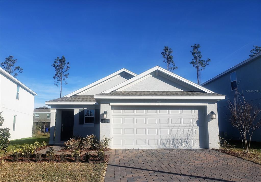 2913 Black Birch Drive Ocoee, FL 34761 - Photo 1 of 1 a front view of a house with garden