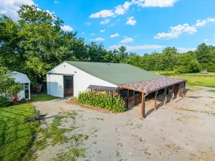 a view of a green field with clear sky