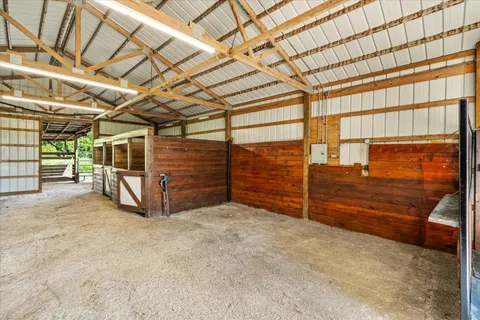 a view of a field with an ocean view