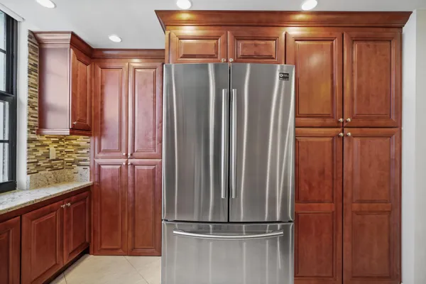 a view of a hallway with washer and dryer