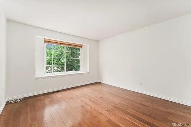 a view of an empty room with a garage