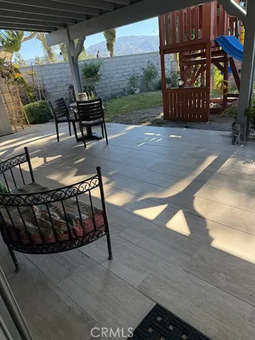 a view of a porch with furniture