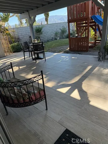 a view of a porch with furniture