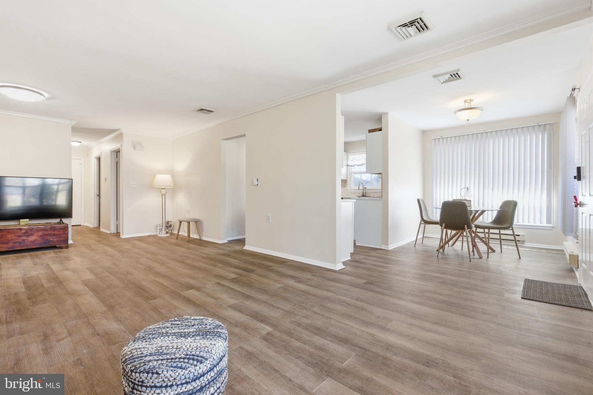 43B Magnolia Road Manahawkin, NJ 08050 - Photo 13 of 26 a living room with furniture and a flat screen tv