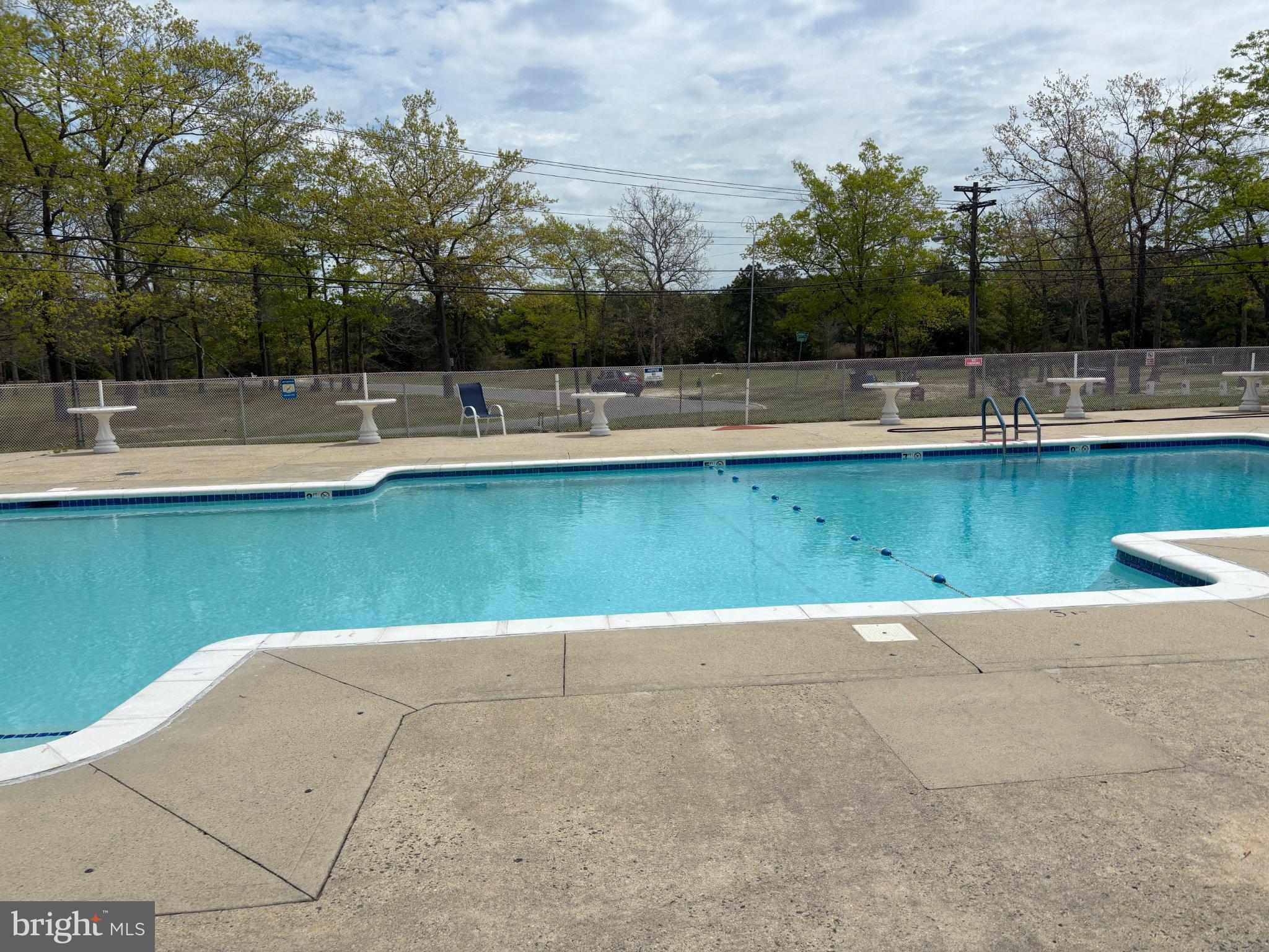 43B Magnolia Road Manahawkin, NJ 08050 - Photo 24 of 26 a view of a swimming pool with a lake
