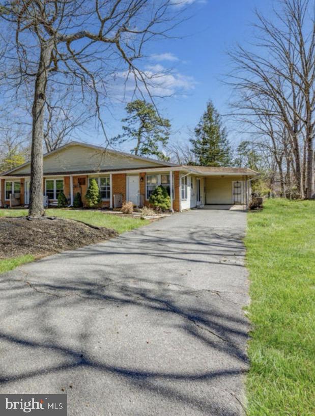 43B Magnolia Road Manahawkin, NJ 08050 - Photo 3 of 26 front view of house with a yard