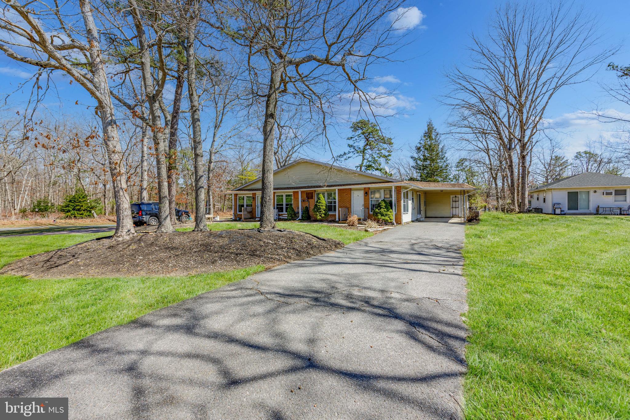 43B Magnolia Road Manahawkin, NJ 08050 - Photo 4 of 26 a front view of house with yard