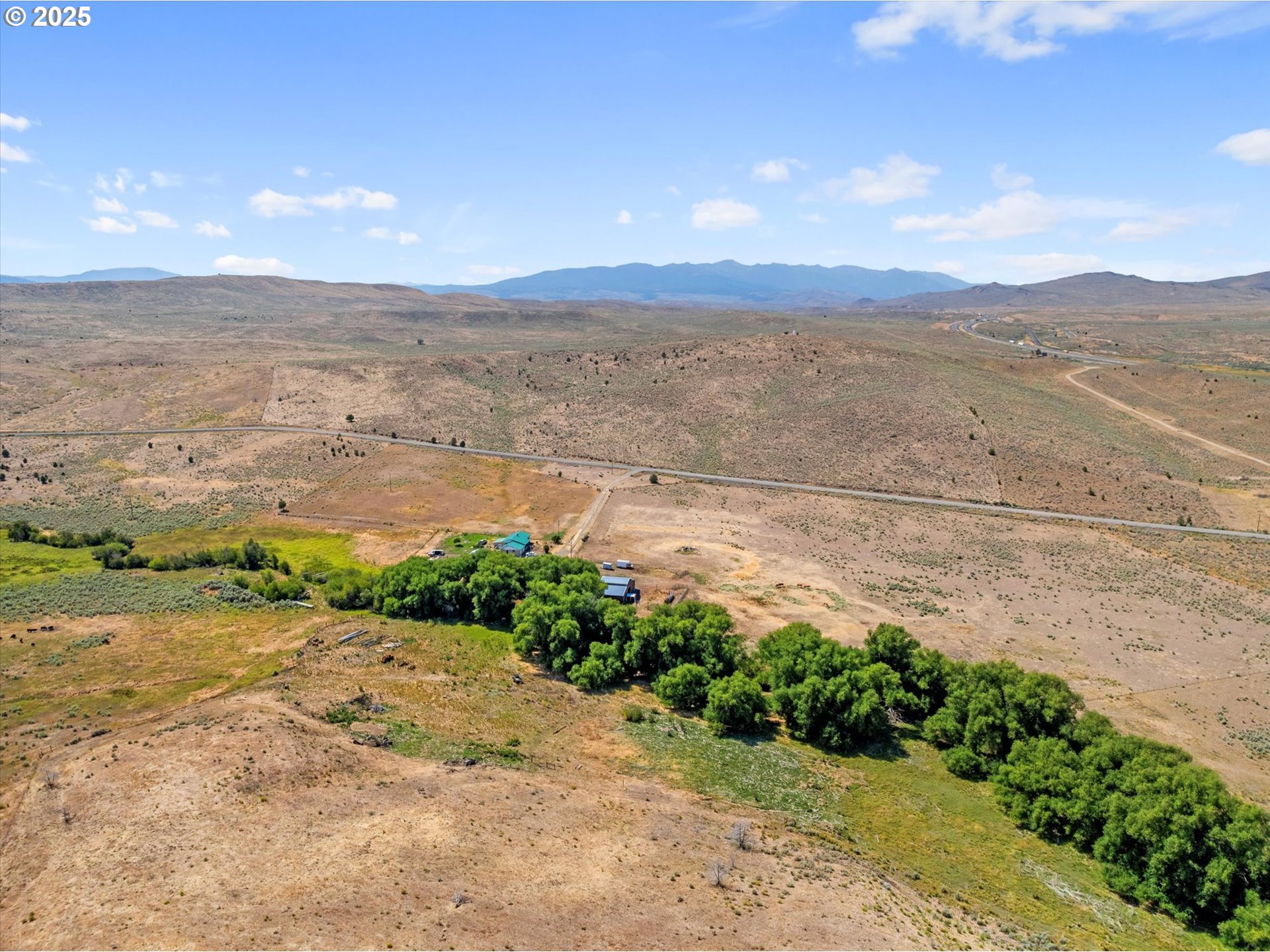 37799 Alder Creek Road Baker City, OR 97814 - Photo 23 of 41 a view of an ocean beach and mountain