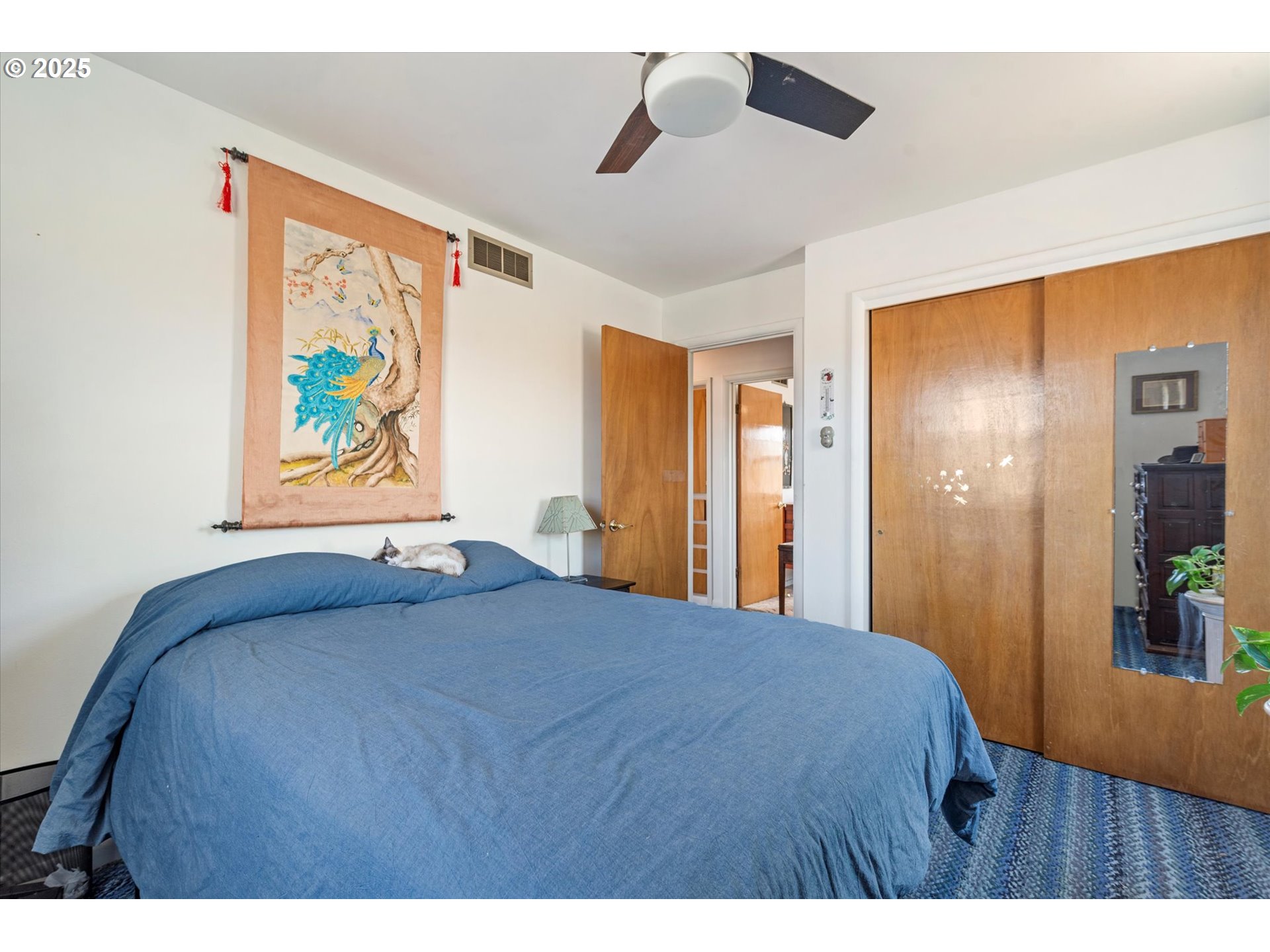 37799 Alder Creek Road Baker City, OR 97814 - Photo 28 of 41 a bedroom with a bed and a painting on the wall