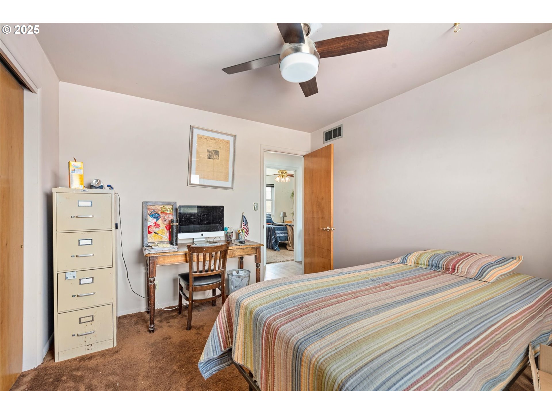 37799 Alder Creek Road Baker City, OR 97814 - Photo 30 of 41 a bedroom with a bed and a television