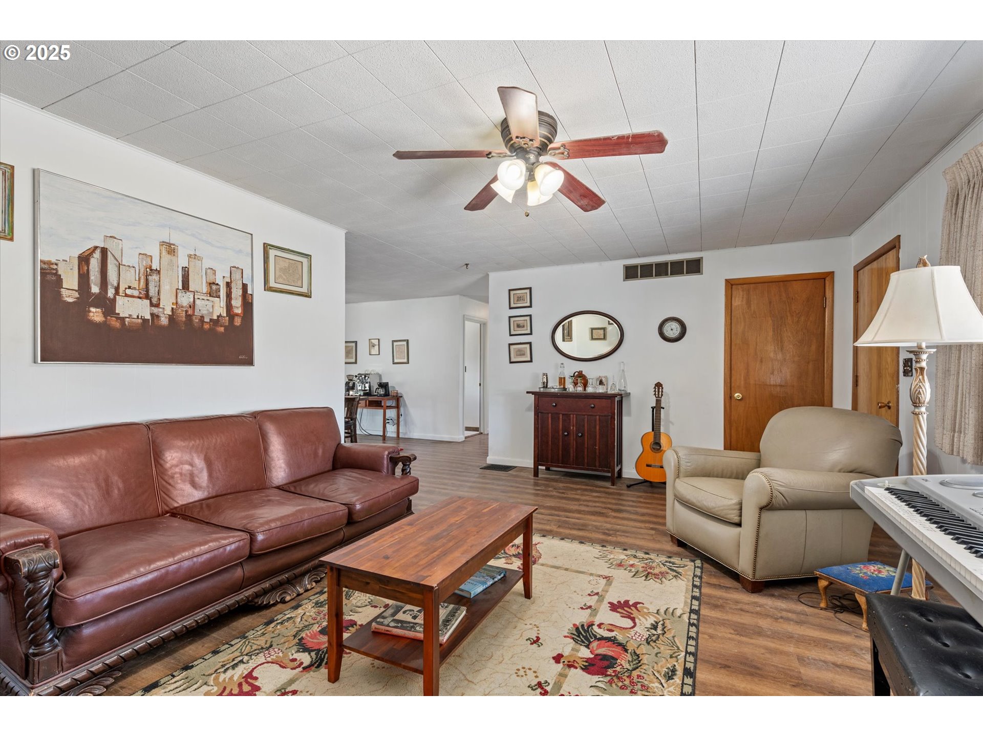 37799 Alder Creek Road Baker City, OR 97814 - Photo 4 of 41 a living room with furniture a rug and a window