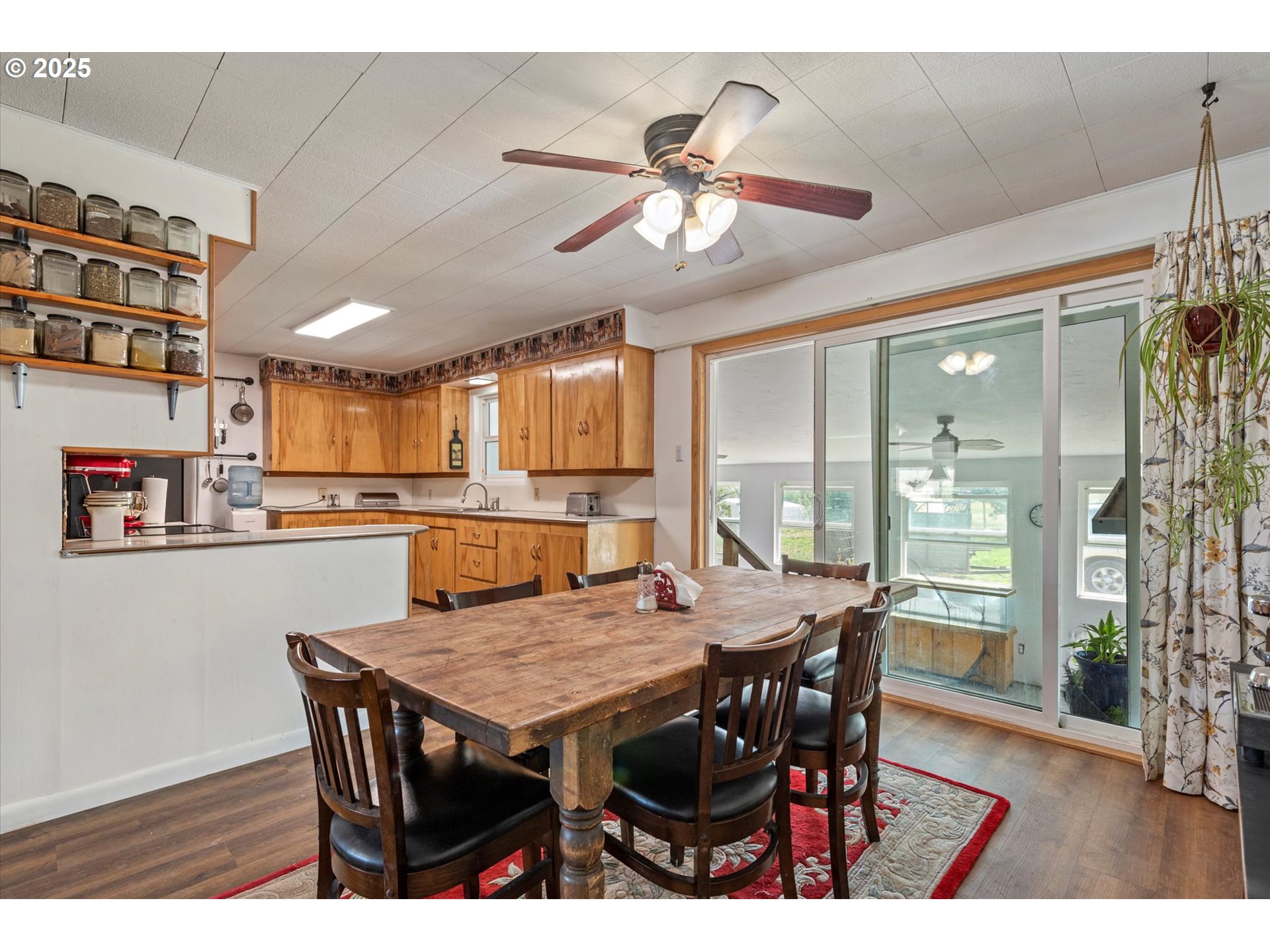 37799 Alder Creek Road Baker City, OR 97814 - Photo 6 of 41 a dining room with a wooden table and chairs