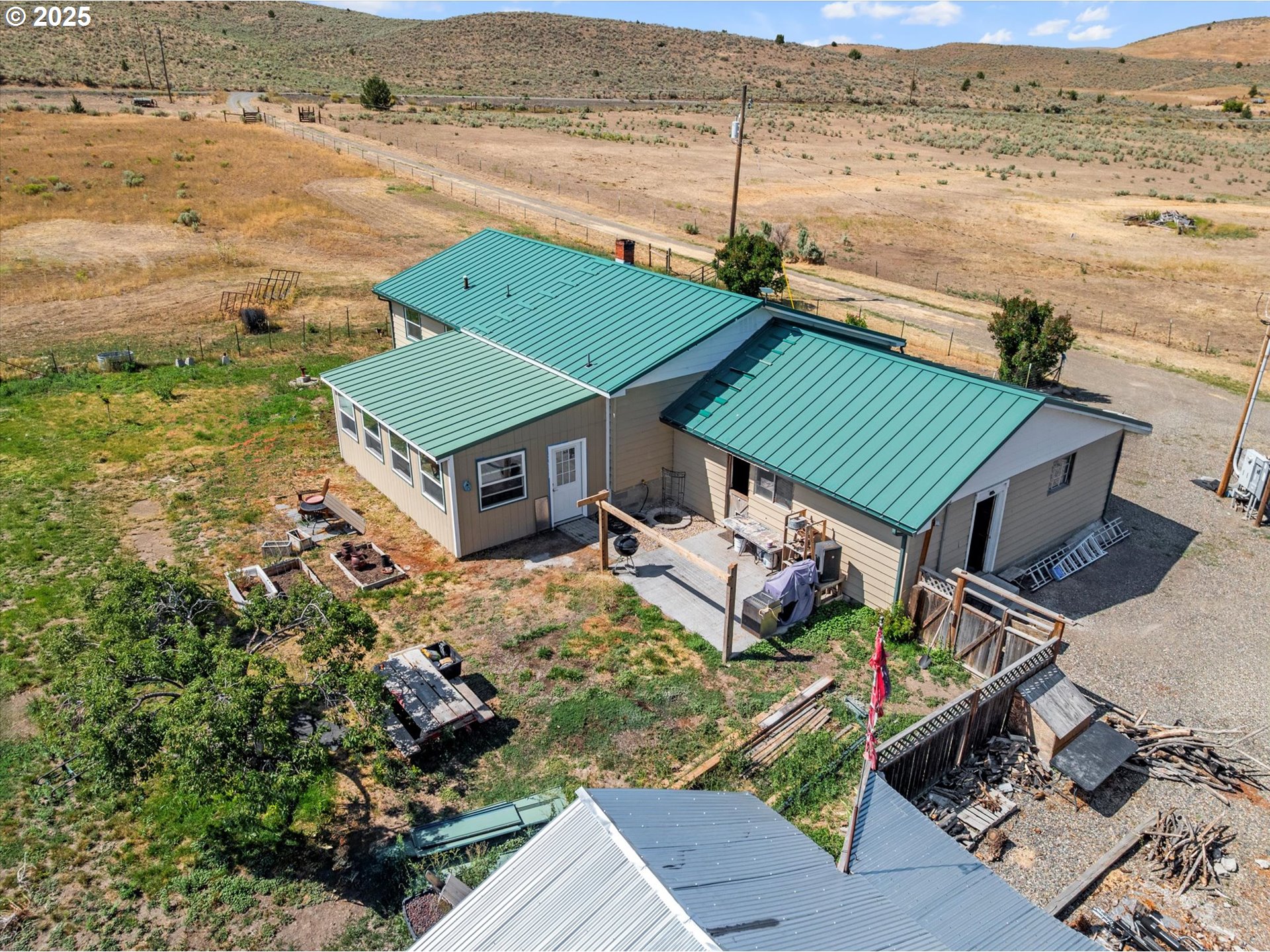 37799 Alder Creek Road Baker City, OR 97814 - Photo 9 of 41 an aerial view of houses with outdoor space