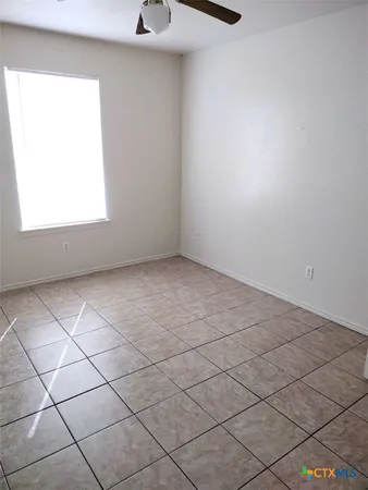 an empty room with a window