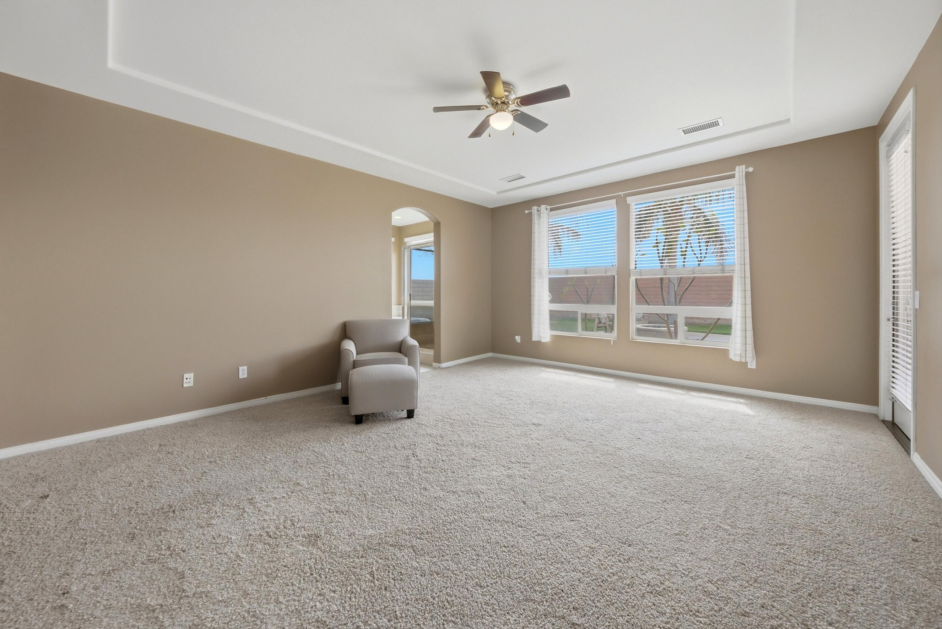 232 Via Firenza Rancho Mirage, CA 92270 - Photo 23 of 43 a living room with furniture and ceiling fan