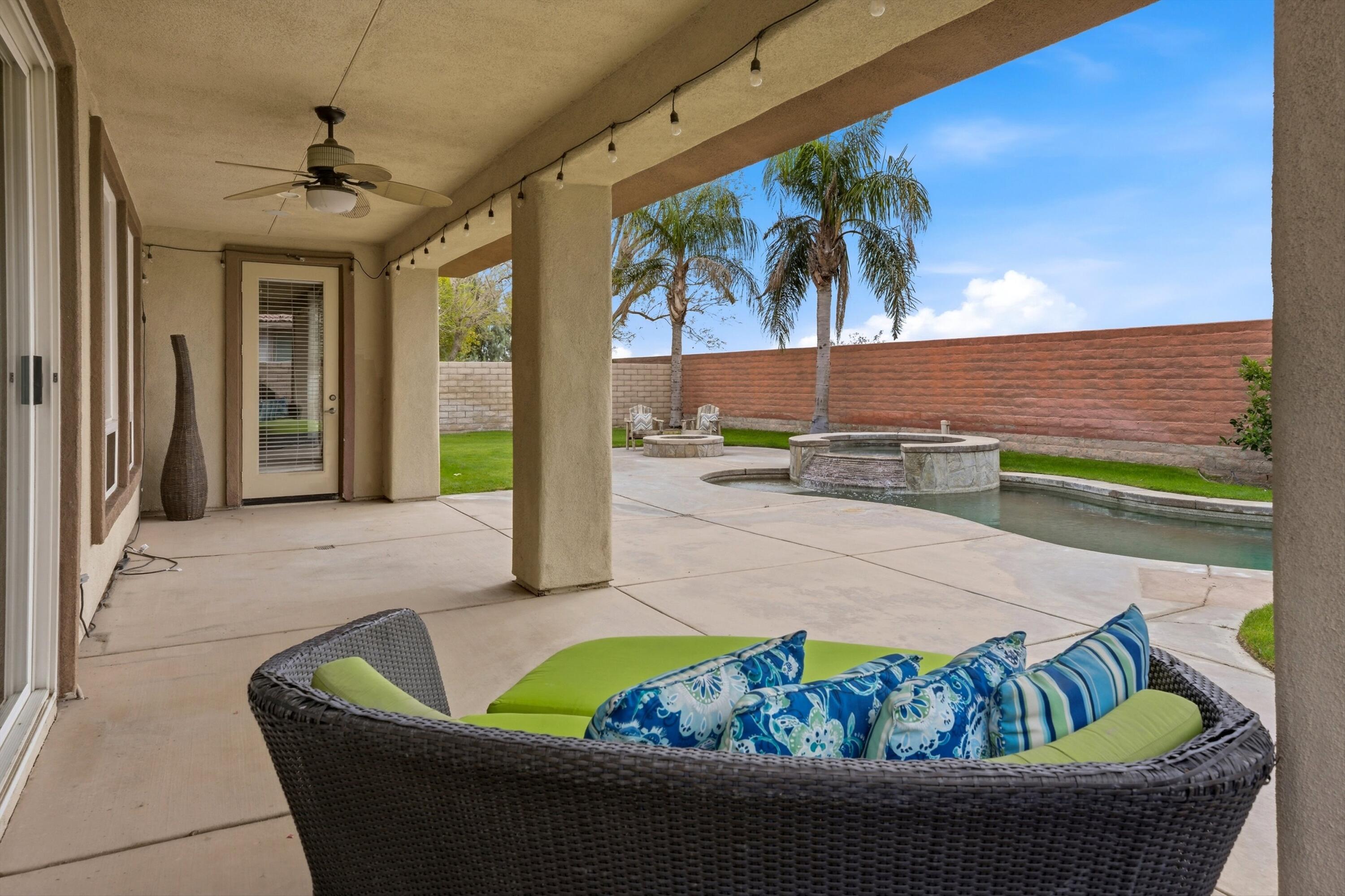 232 Via Firenza Rancho Mirage, CA 92270 - Photo 29 of 43 a living room with furniture and a potted plant