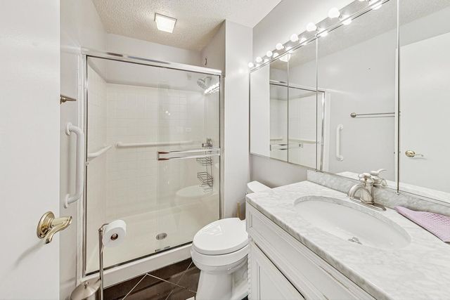 a view of a chairs and table in a room
