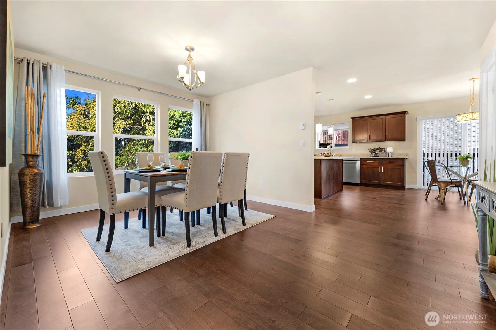 10034 59th Avenue South Seattle, WA 98178 - Photo 11 of 39 a view of a dining room with furniture window and wooden floor