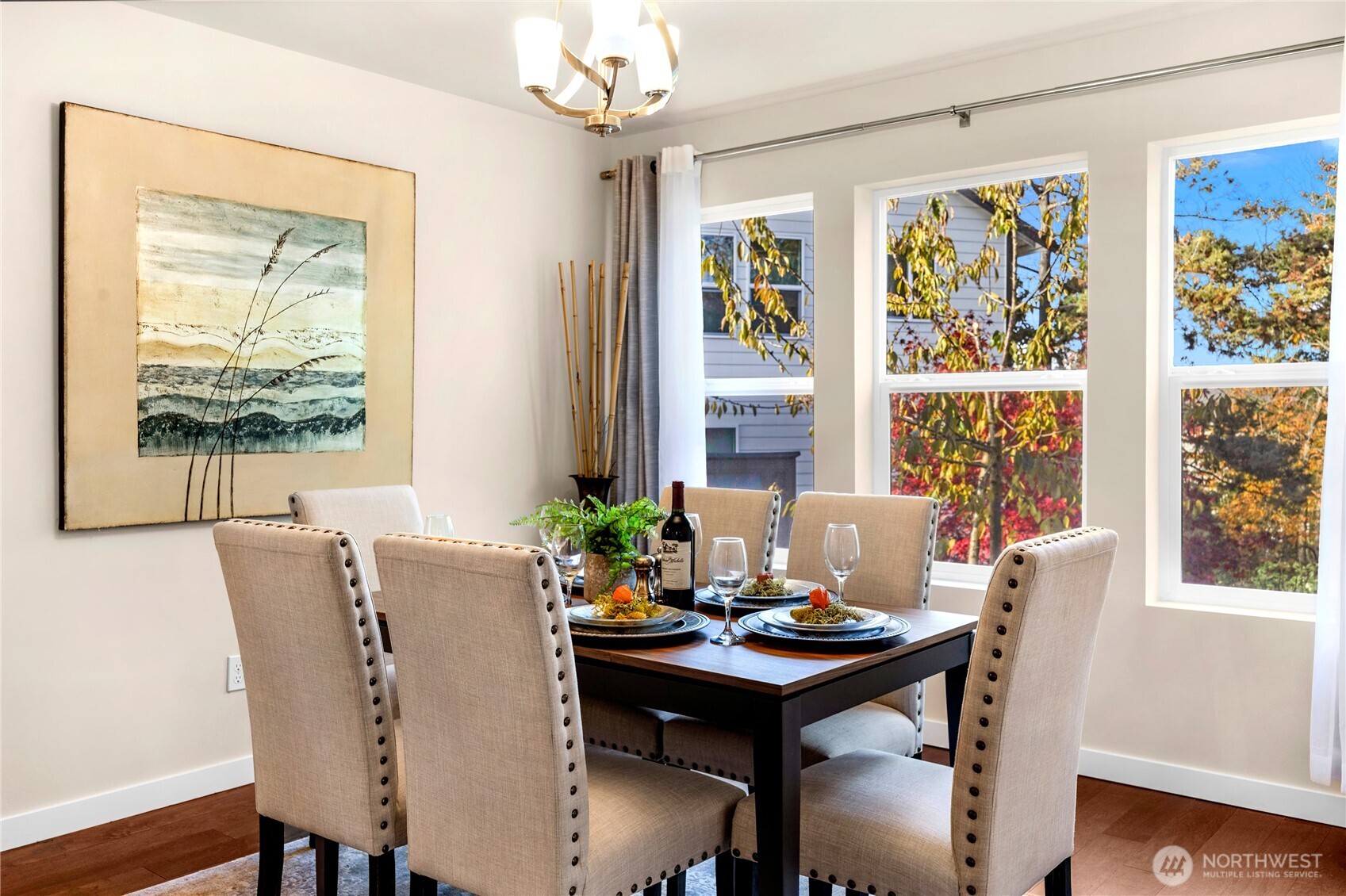 10034 59th Avenue South Seattle, WA 98178 - Photo 9 of 39 a view of a dining room with furniture window and wooden floor