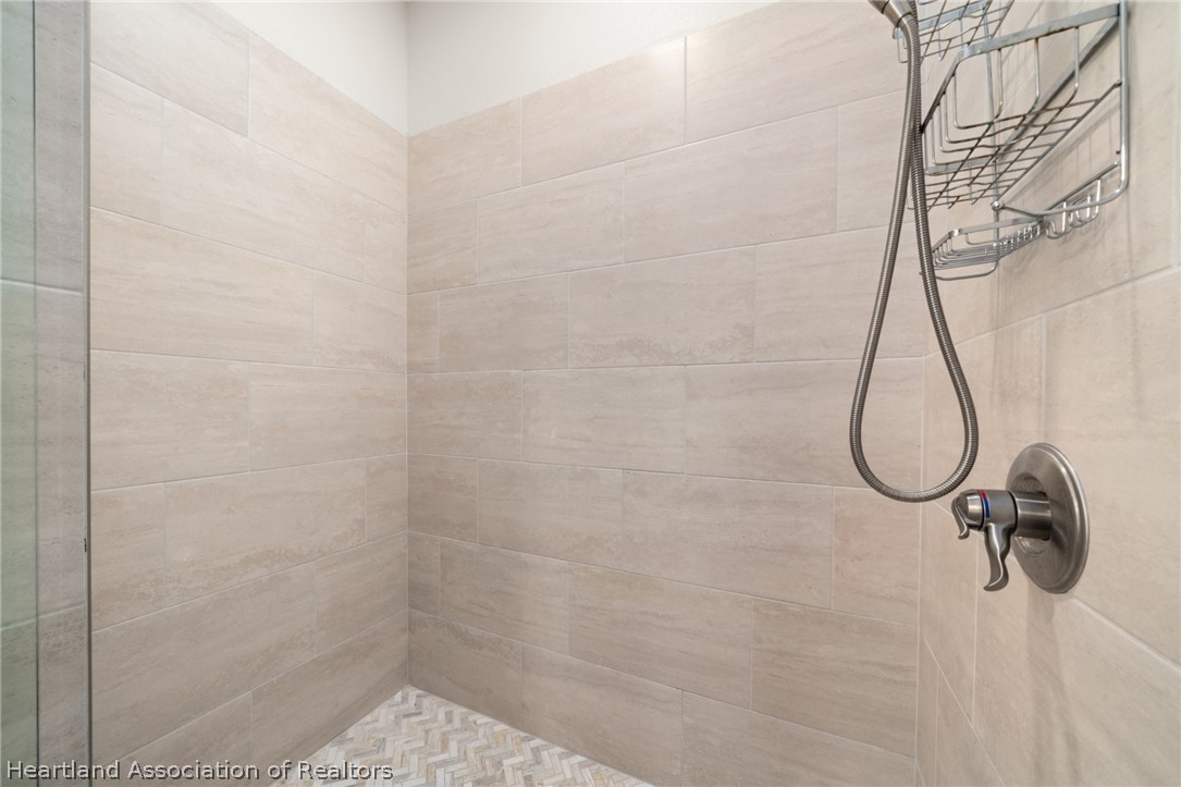 4734 Haw Branch Road, Unit 110 Sebring, FL 33875 - Photo 24 of 50 a bathroom with a shower