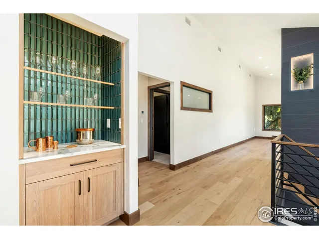 a kitchen with a table and chairs