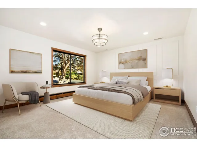 a bathroom with a double vanity sink mirror and shower