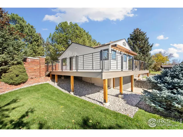 a view of backyard with swimming pool
