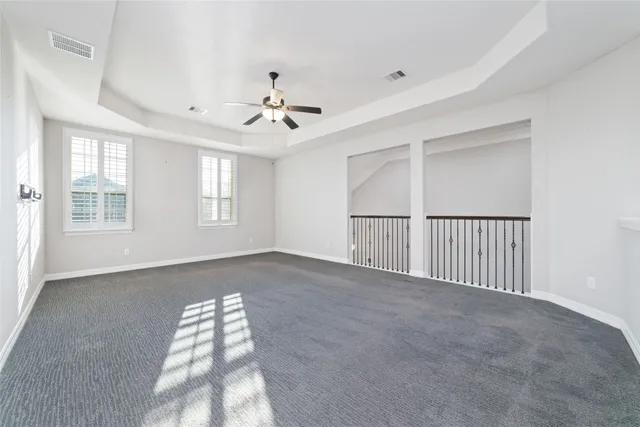 a view of empty room with windows