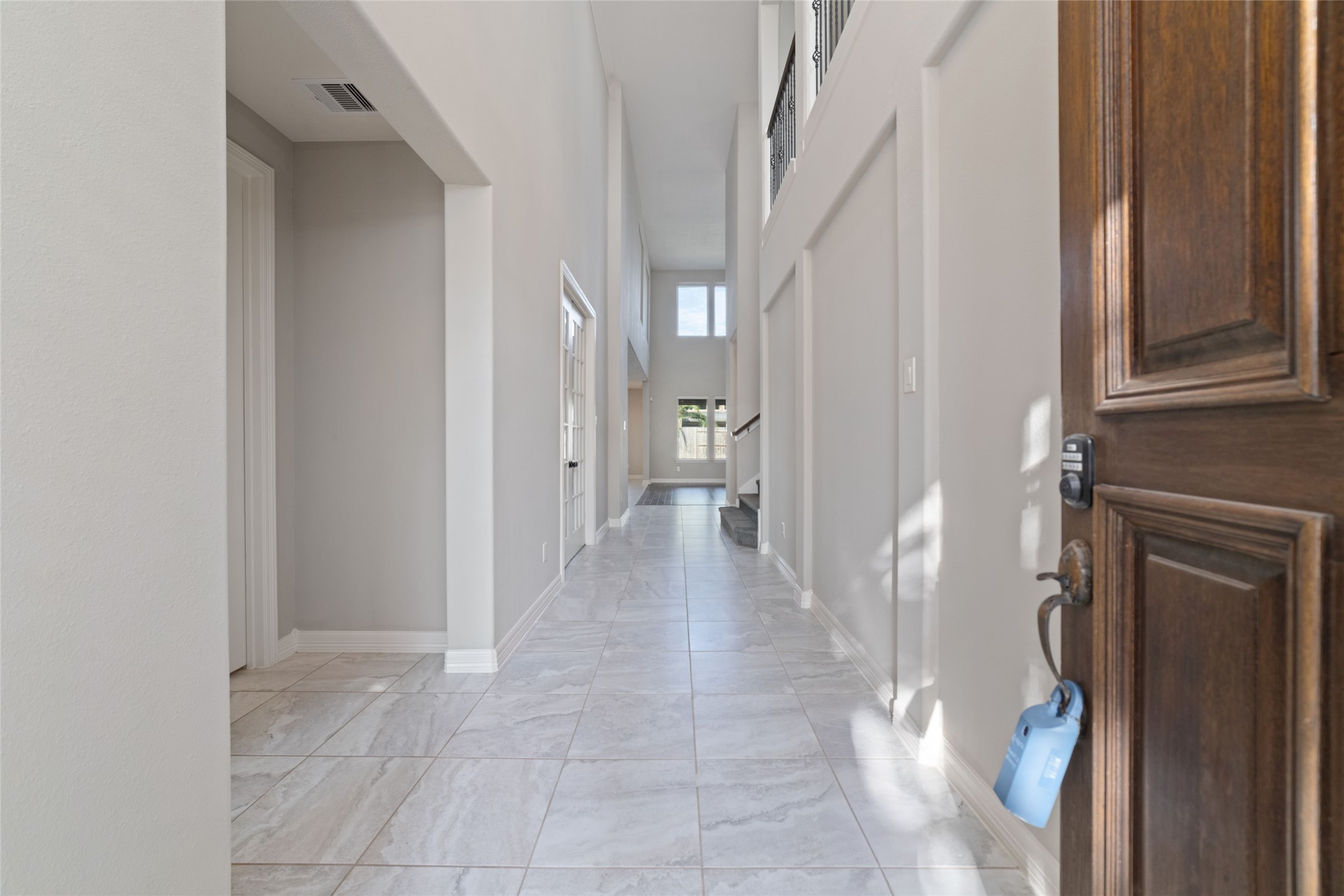 27506 Windcrest Key Lane Fulshear, TX 77441 - Photo 7 of 36 Dramatic front entryway