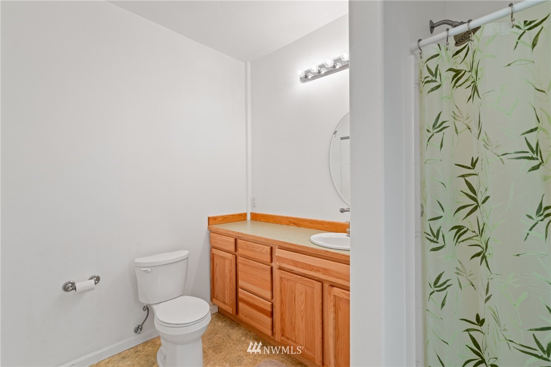 2711 Squilchuck Road Wenatchee, WA 98801 - Photo 24 of 32 a bathroom with a sink and toilet