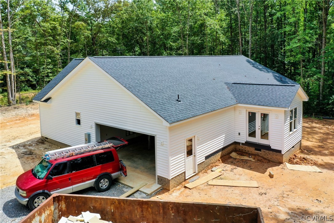19173 Teman Road Beaverdam, VA 23015 - Photo 11 of 35 a backyard of a house with barbeque oven