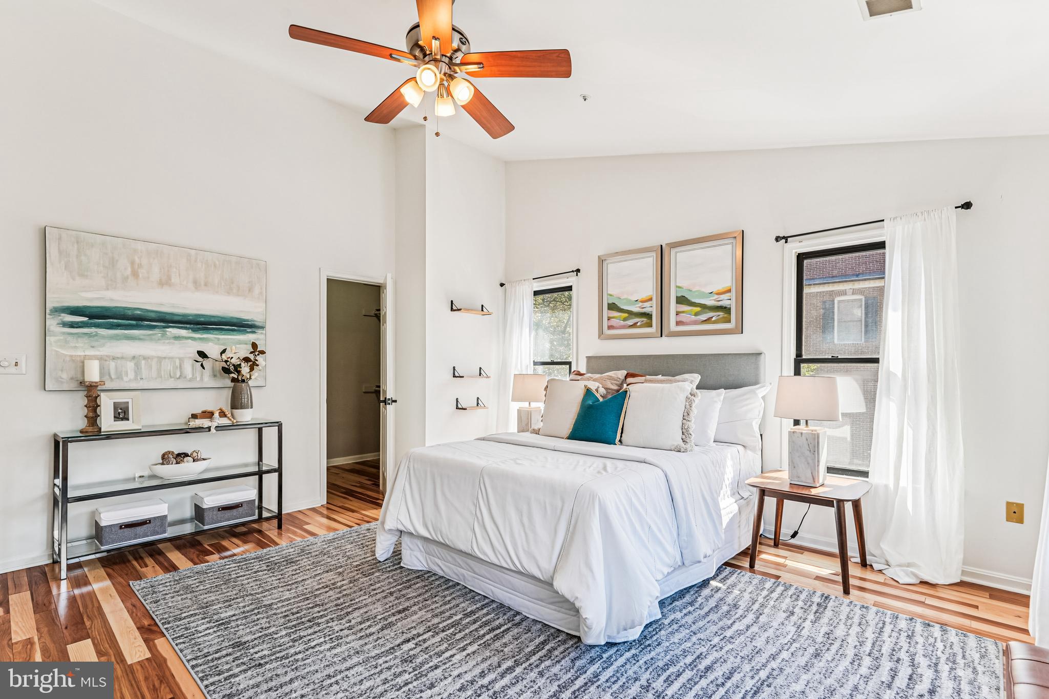 120 Ridgepoint Place Gaithersburg, MD 20878 - Photo 16 of 51 a bedroom with a bed and a chandelier