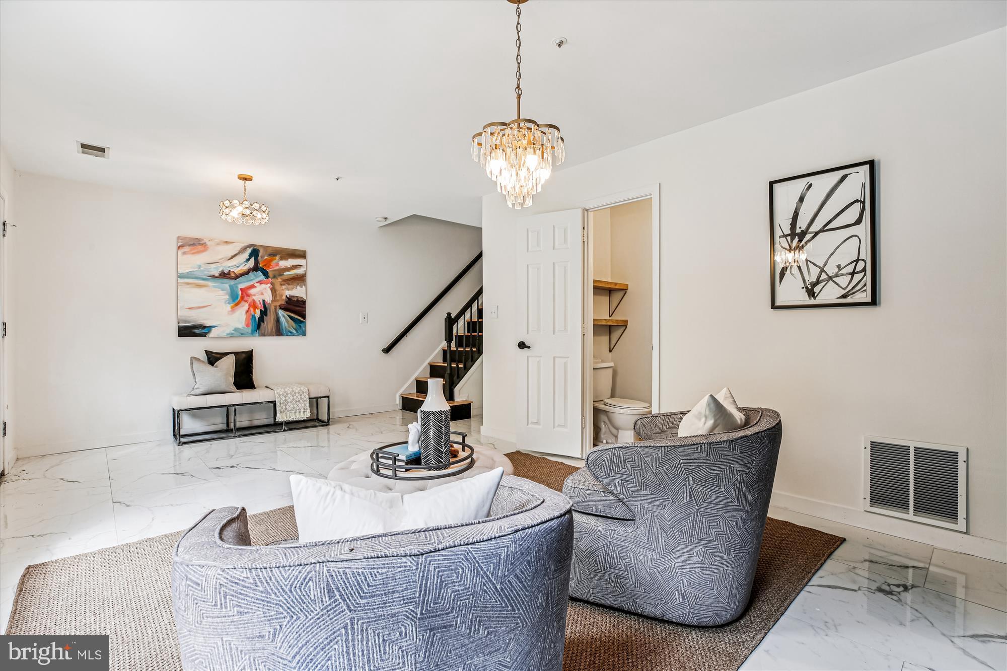 120 Ridgepoint Place Gaithersburg, MD 20878 - Photo 29 of 51 a living room with furniture and a chandelier