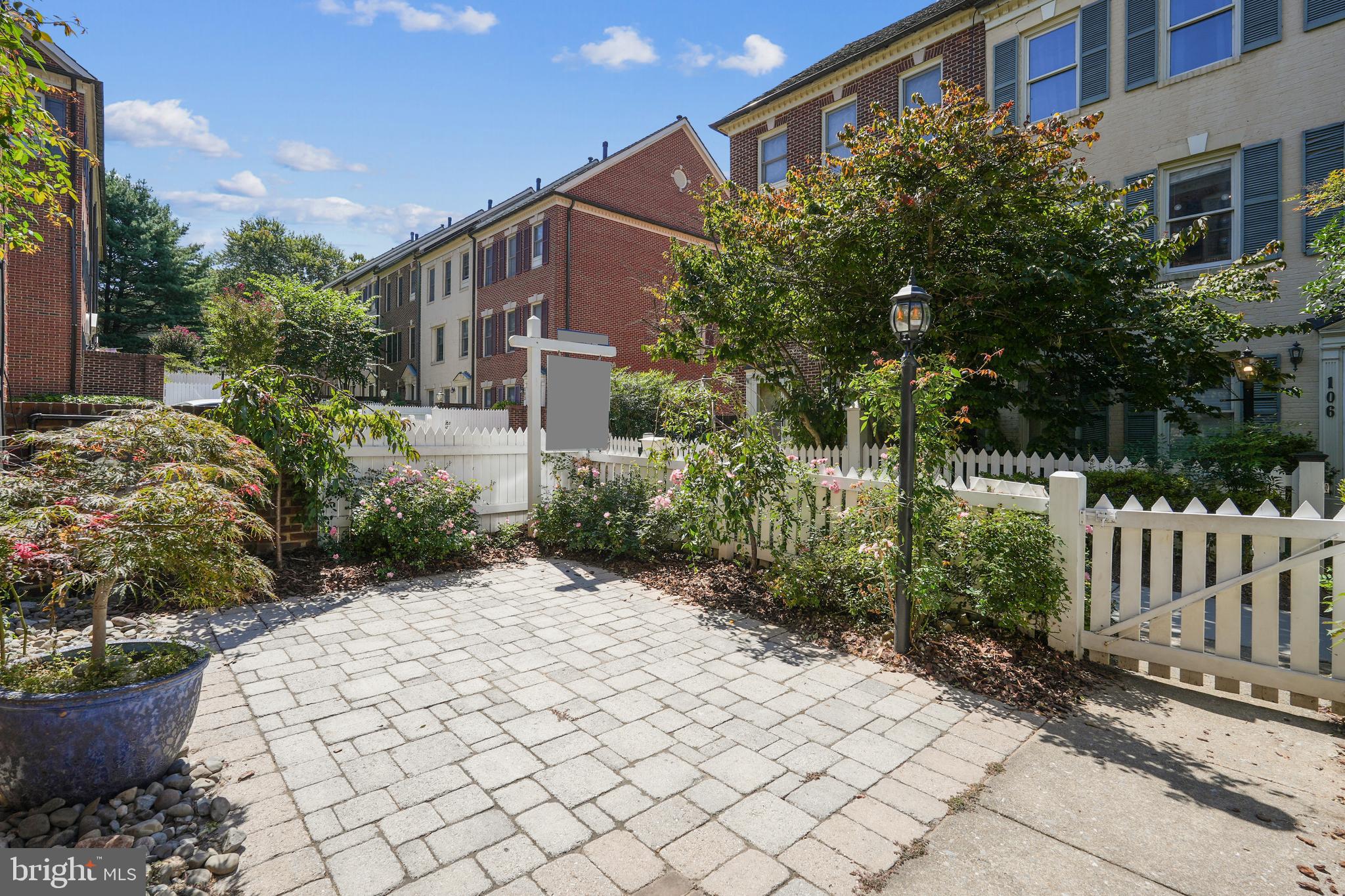 120 Ridgepoint Place Gaithersburg, MD 20878 - Photo 33 of 51 a view of a backyard with plants and trees