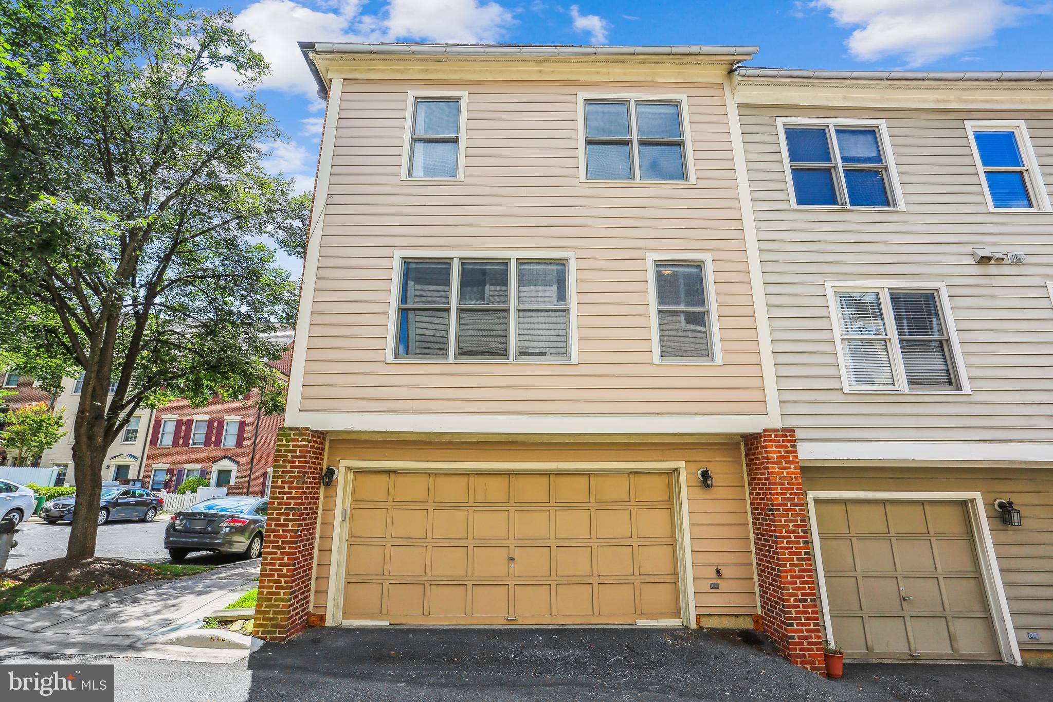 120 Ridgepoint Place Gaithersburg, MD 20878 - Photo 34 of 51 a front view of a house with parking