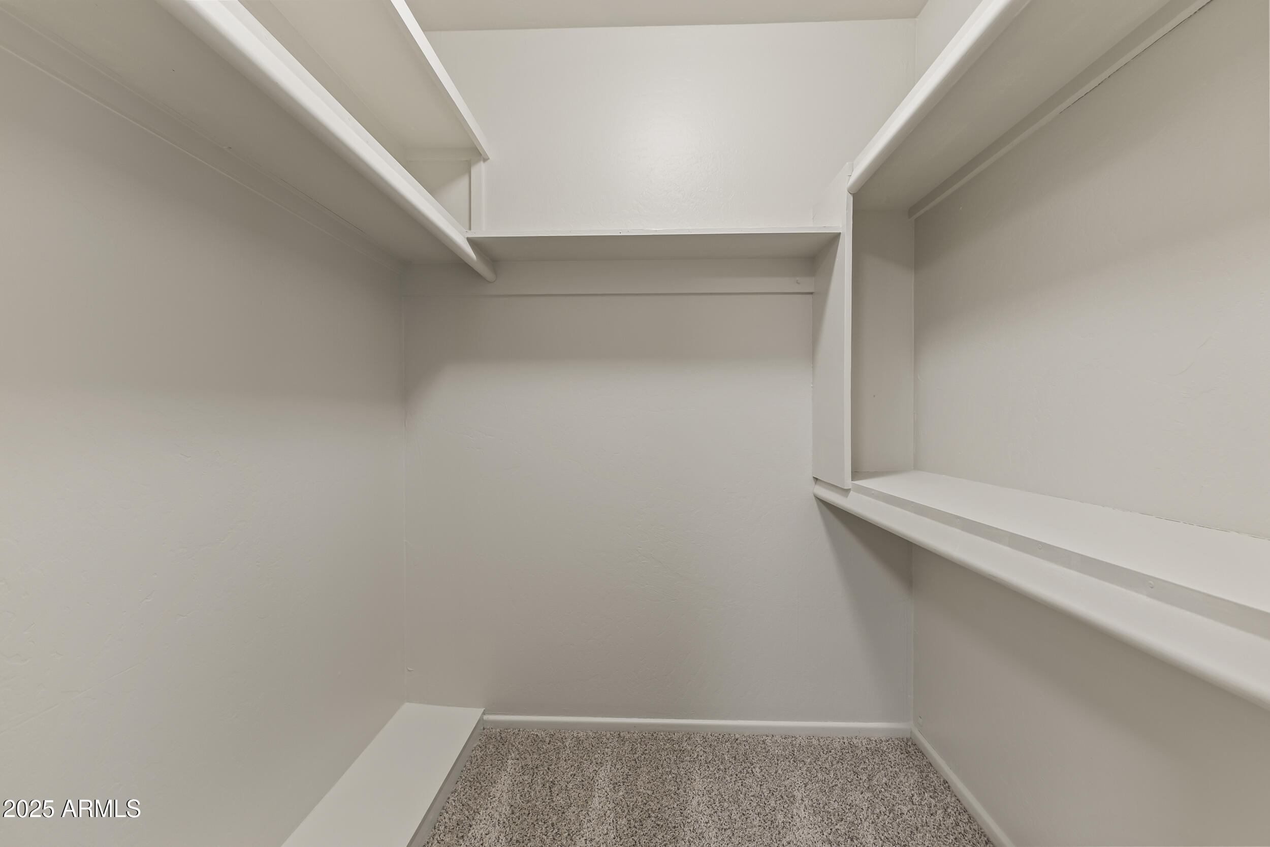 6835 North 1st Place Phoenix, AZ 85012 - Photo 22 of 42 a view of small space with racks on the wall