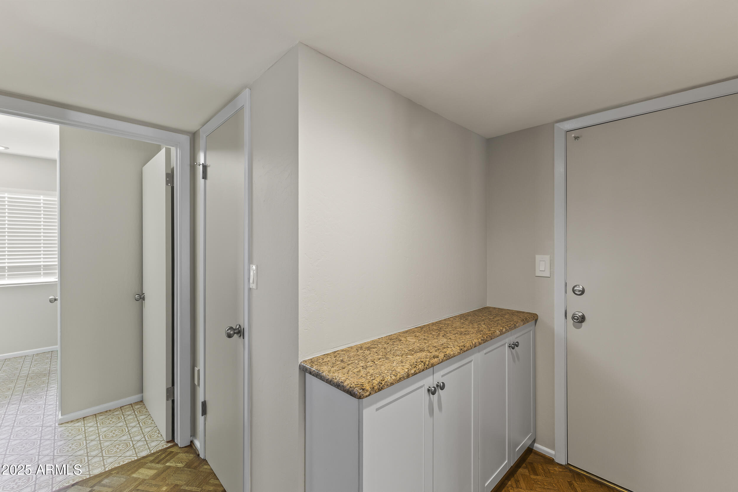6835 North 1st Place Phoenix, AZ 85012 - Photo 31 of 42 a view of a kitchen with wooden floor