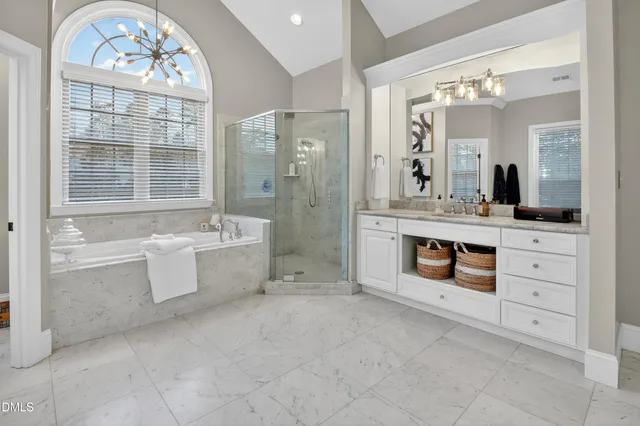 a living room with stainless steel appliances kitchen island granite countertop furniture and a view of living room
