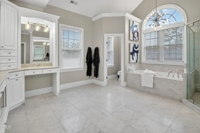 a view of a roof deck with wooden floor and fence