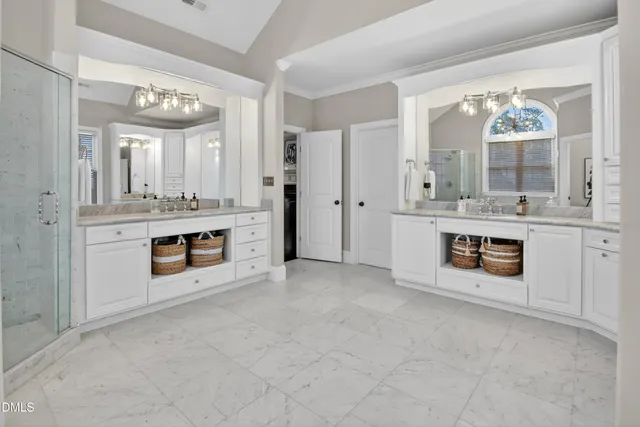 an aerial view of a swimming pool patio and outdoor seating