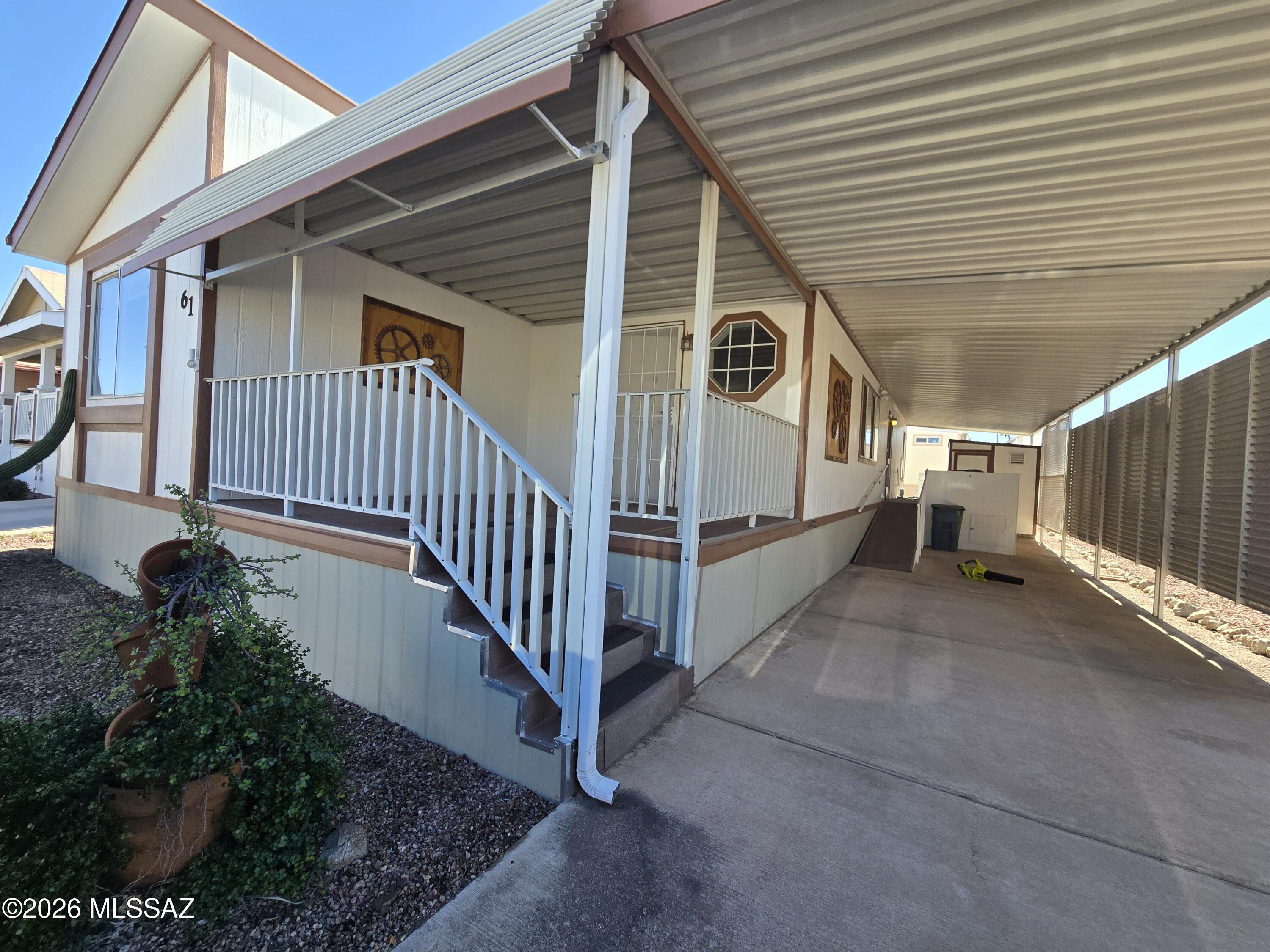 8401 South Kolb Road, Unit 61 Tucson, AZ 85756 - Photo 2 of 23 a view of back yard of the house