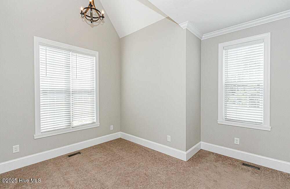 8700 Commercial Road Elm City, NC 27822 - Photo 30 of 74 Primary bedroom on 1st floor with additional sitting area.